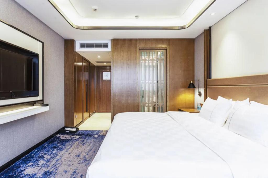 Linyi Blue Horizon Intenational Hotel Екстер'єр фото