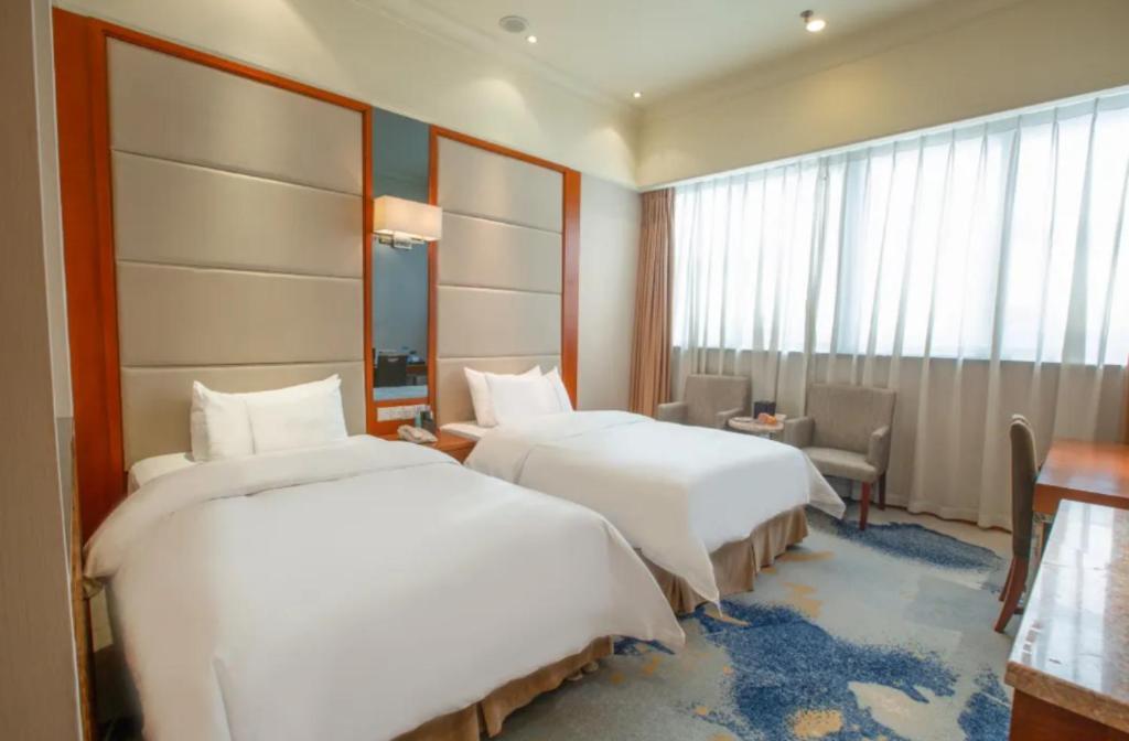 Linyi Blue Horizon Intenational Hotel Екстер'єр фото