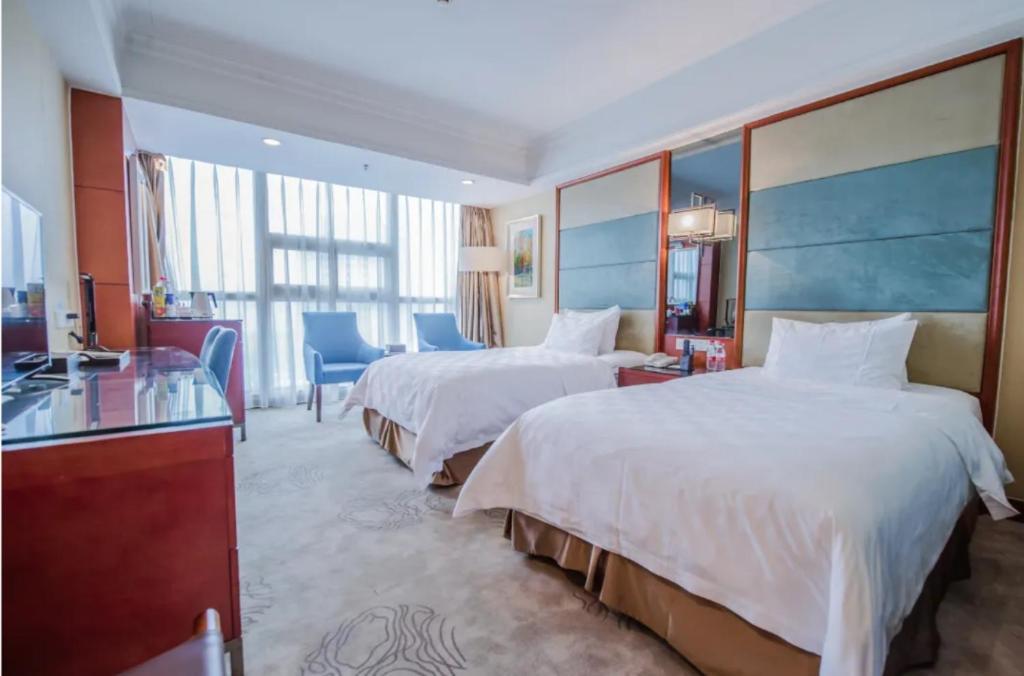 Linyi Blue Horizon Intenational Hotel Екстер'єр фото